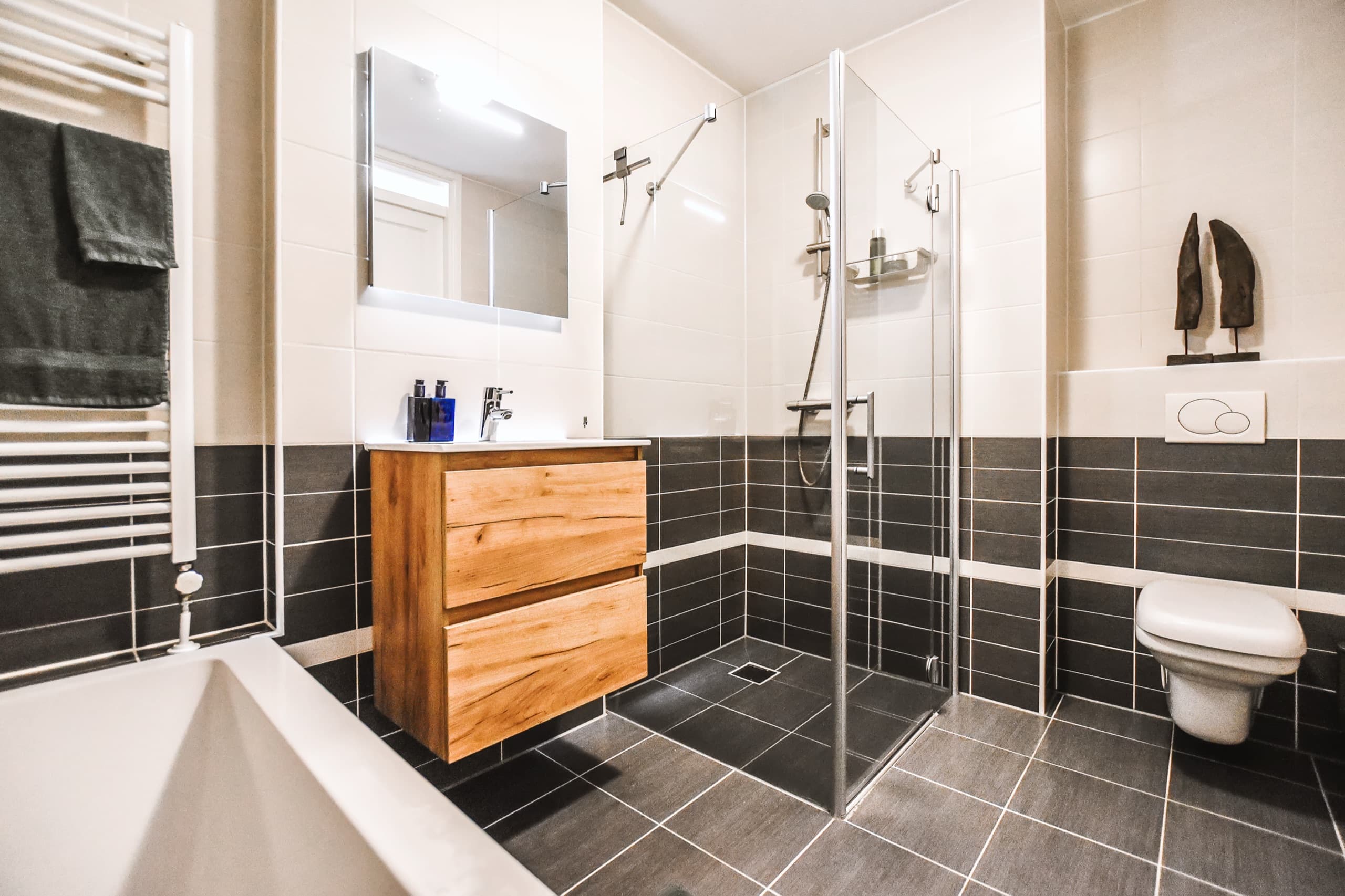 Wood vanity with glass shower